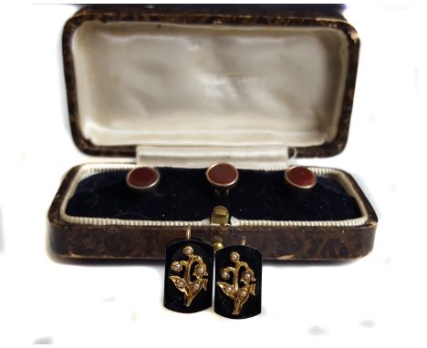 A pair of antique black onyx split pearl and gold earstuds, c1890, arched rectangle shaped black onyx applied with small spli