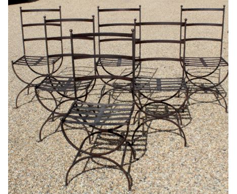 A set of six vintage steel dining chairs originally retailed by Cianciminos, Kings Road London, X frame legs under ladder bac