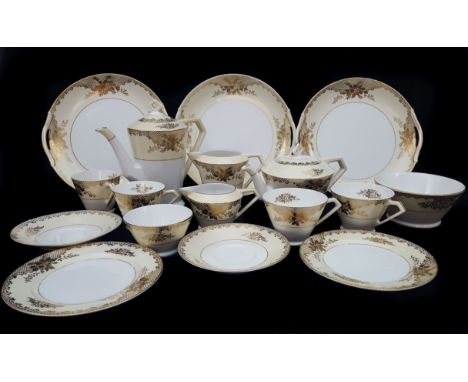 A Noritake Japanese porcelain tea/coffee service, pale cream ground borders gilded with foliate motifs on an Art Deco style s