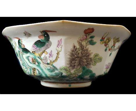 A Chinese porcelain famille verte decorated bowl, enamelled with birds and rockwork, a red scaly dragon to the interior, a dr