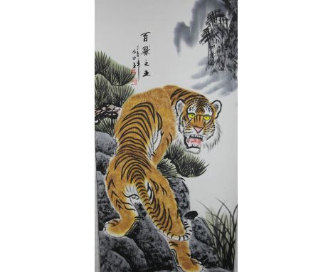A modern Chinese scroll painting of a tiger; and one other of an eagle (2)