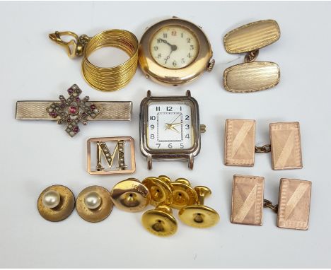 A small scrap 9ct gold wrist watch; a 9ct gold and split pearl 'm' slide; a gem set brooch; various studs and cufflinks etc. 