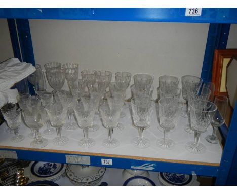 A shelf of assorted wine glasses. COLLECT ONLY.