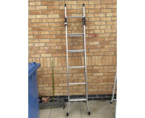 A 3 way aluminium combination ladder