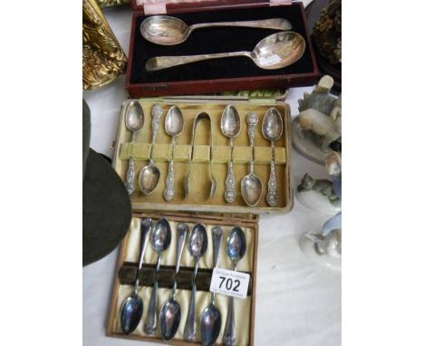 Three cased sets of vintage spoons.