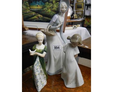 Three figurines including Royal Doulton, NAO etc.,