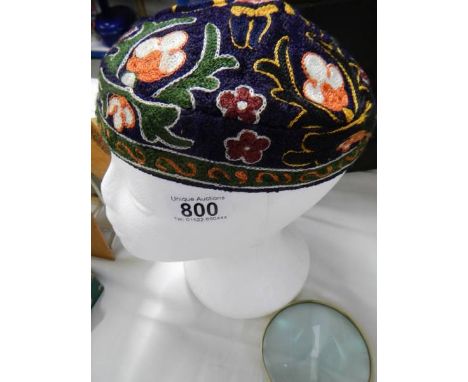 A vintage smoking cap.