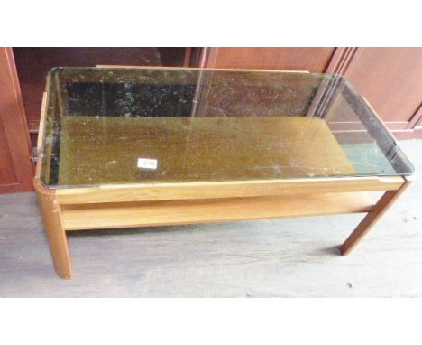 TEAK COFFEE TABLE. Teak table with smoked glass top and lower shelf, L ~ 90cm