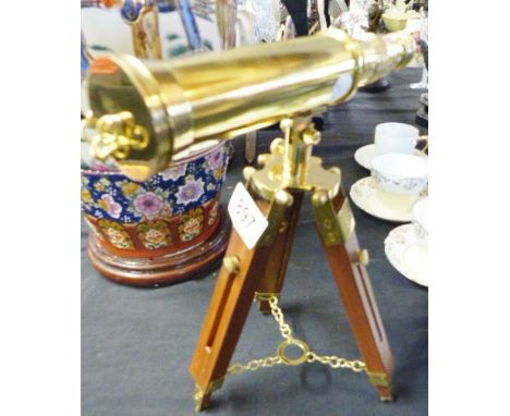 BRASS TELESCOPE. Brass telescope on wooden tripod