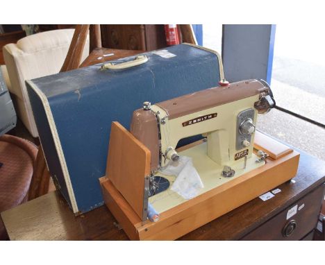 A vintage Zenith Deluxe sewing machine