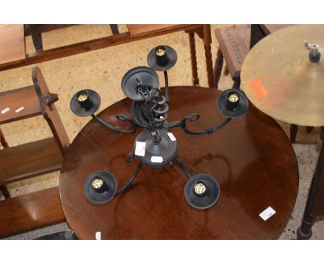 A modern five branch ceiling light fitting