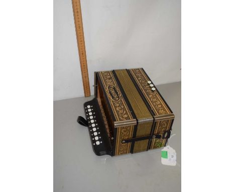 A small Hohner accordion