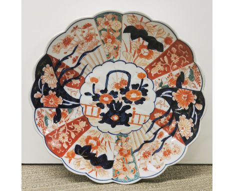 A Japanese Imari plate, Dia. 31cm.
