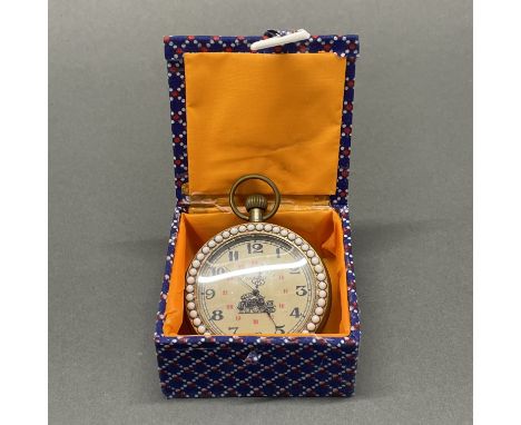 A reproduction pocket watch.