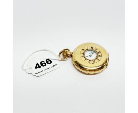 A goldplated half hunter pocket watch.