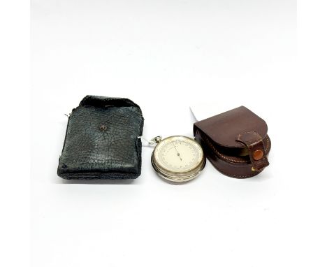 A leather cased portable barometer.