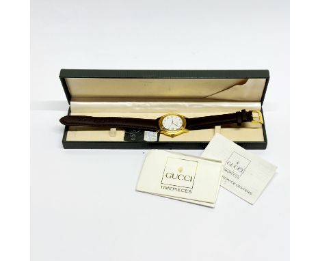 A Gucci goldplated gent's wristwatch.