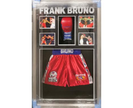 Autograph interest. A framed signed boxing glove and shorts for Frank Bruno, frame 124 x 84cm.