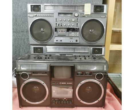 A Sharp 2 way dynamic sound stereo radio cassette recorder with two JVC 8 band stereo cassette recorder, largest L. 66cm.