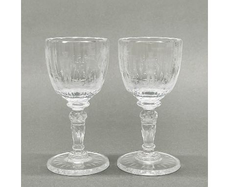 A pair of Moser finely engraved cognac glasses, H. 11.5cm.