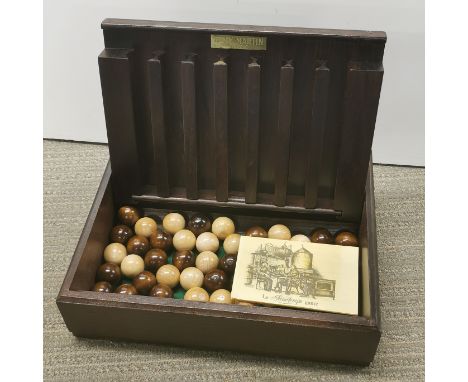 A Remy Martin wooden bar game, size 29cm x 23cm.