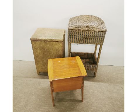 A Lloyd Loom wicker two tier sewing box together with a small teak sewing box and a wicker linen basket, largest 82 x 42 x 28