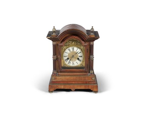 A LATE 19TH / EARLY 20TH CENTURY CONTINENTAL BRACKET CLOCK, of arched rectangular form, the domed top flanked with twin point