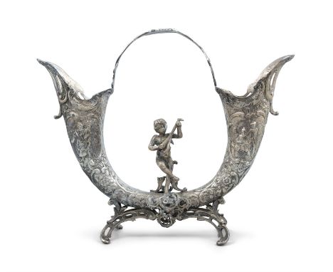 A CONTINENTAL WHITE METAL POSIE HOLDER, in the form of a turn cornucopia, connected with cast handle, above model of cherub p