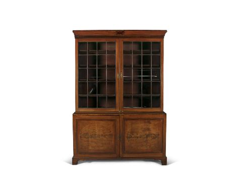 A 19TH CENTURY MAHOGANY TALL BOOKCASE, with moulded cornice above twin astragal glazed panel doors on a cupboard base with tw