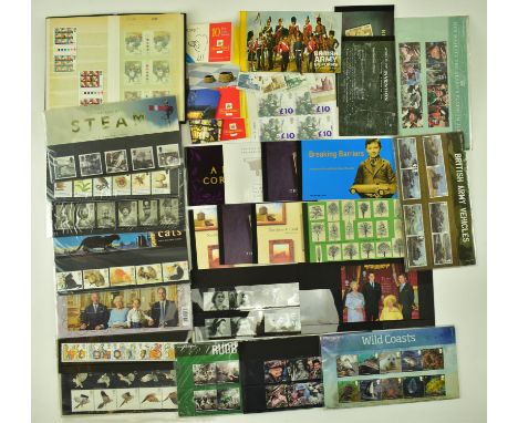 A collection of UK unfranked decimal Queen Elizabeth II presentation packs and loose stamps. The lot to include four &pound;1