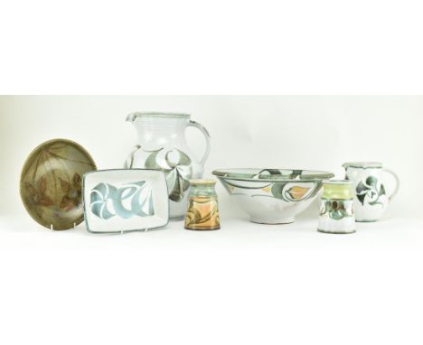 Aldermaston Pottery - a collection of seven pieces of mid century studio pottery ceramics. The lot comprising a large jug, a 