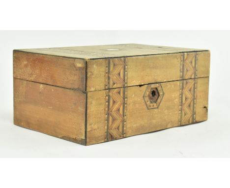 A late 19th century Victorian Tunbridgeware sewing box / desk tidy. The caddy box featuring mother of pearl inset central pan