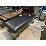 ADJUSTING TREATMENT TABLE WITH ARM REST