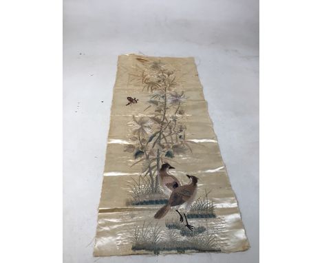 A vintage hand embroidered silk panel of birds and flowers. Some marks and age related damage W:36cm x H:87cm
