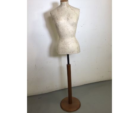 A display mannequin on wooden stand. Waist 23 inches, bust approx 33 inches H:145cm