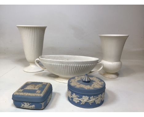 Three Wedgwood flower vases and trough together with two Jasper ware trinket boxes.H:24cm Tallest vase