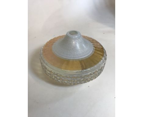 A circular mid century glass ceiling light shade with embossed and painted abstract design