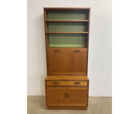 A G Plan mid century two piece wall cupboard. Lower sideboard with internal shelf and double drawer upper unit with drop down