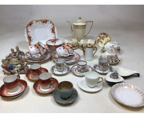 A Melba bone China part tea set together with a Furnivals coffee pot and cups also with cabinet cups and saucers to include S