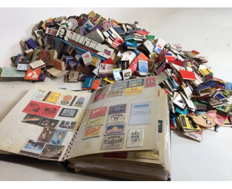 A large collection of vintage matchbox fronts and matchboxes 