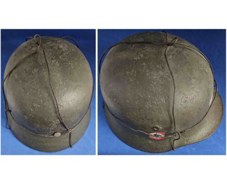 Original WW2 German Military helmet with Nazi swastika on the side. Good condition. All autographs come with a Certificate of
