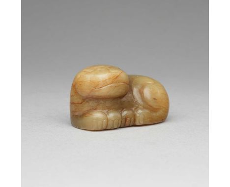AN UNUSUAL CHINESE YELLOW JADE 'LION' WEIGHT SONG-MING DYNASTY5.6cm.Neatly carved with its head turned to one side above a ro