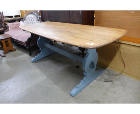 An Ercol painted elm abd beech refectory table 