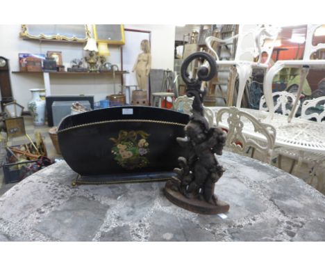 A painted planter and a Victorian cast iron doorstop 