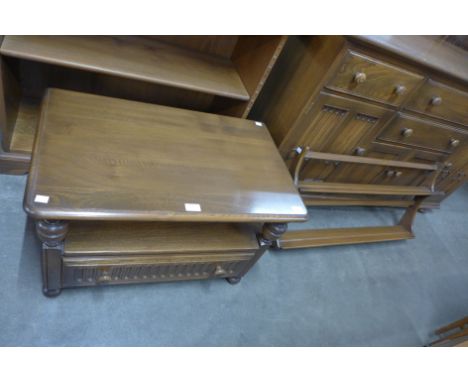 An Ercol Golden Dawn elm and beech TV stand and a plate rack 