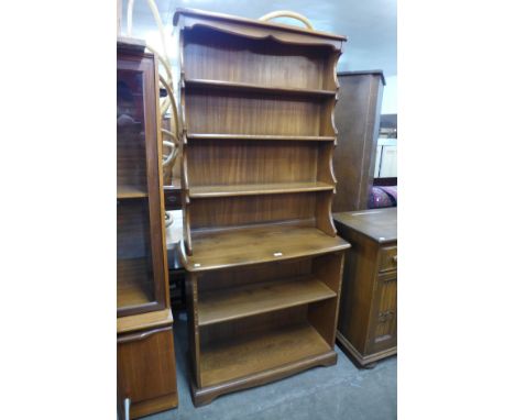 An Ercol Golden Dawn ash bookcase 
