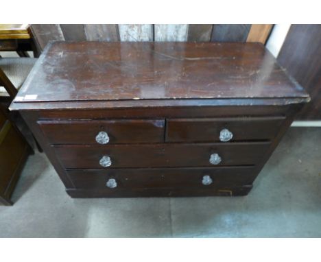 A steamer trunk and a stained pine chest of drawers 