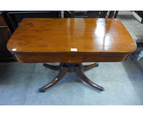 A Victorian mahogany card table 