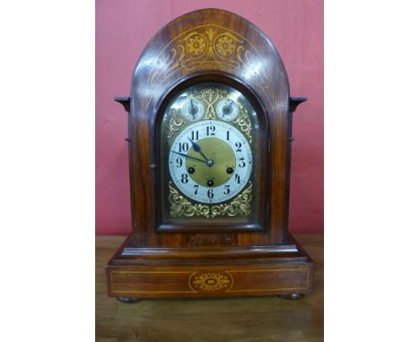 A 19th Century German Junghans rosewood and marquetry inlaid lancet shaped bracket clock, 45cms h 