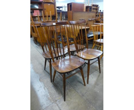 A set of four Ercol Golden Dawn elm and beech 608 model chairs 